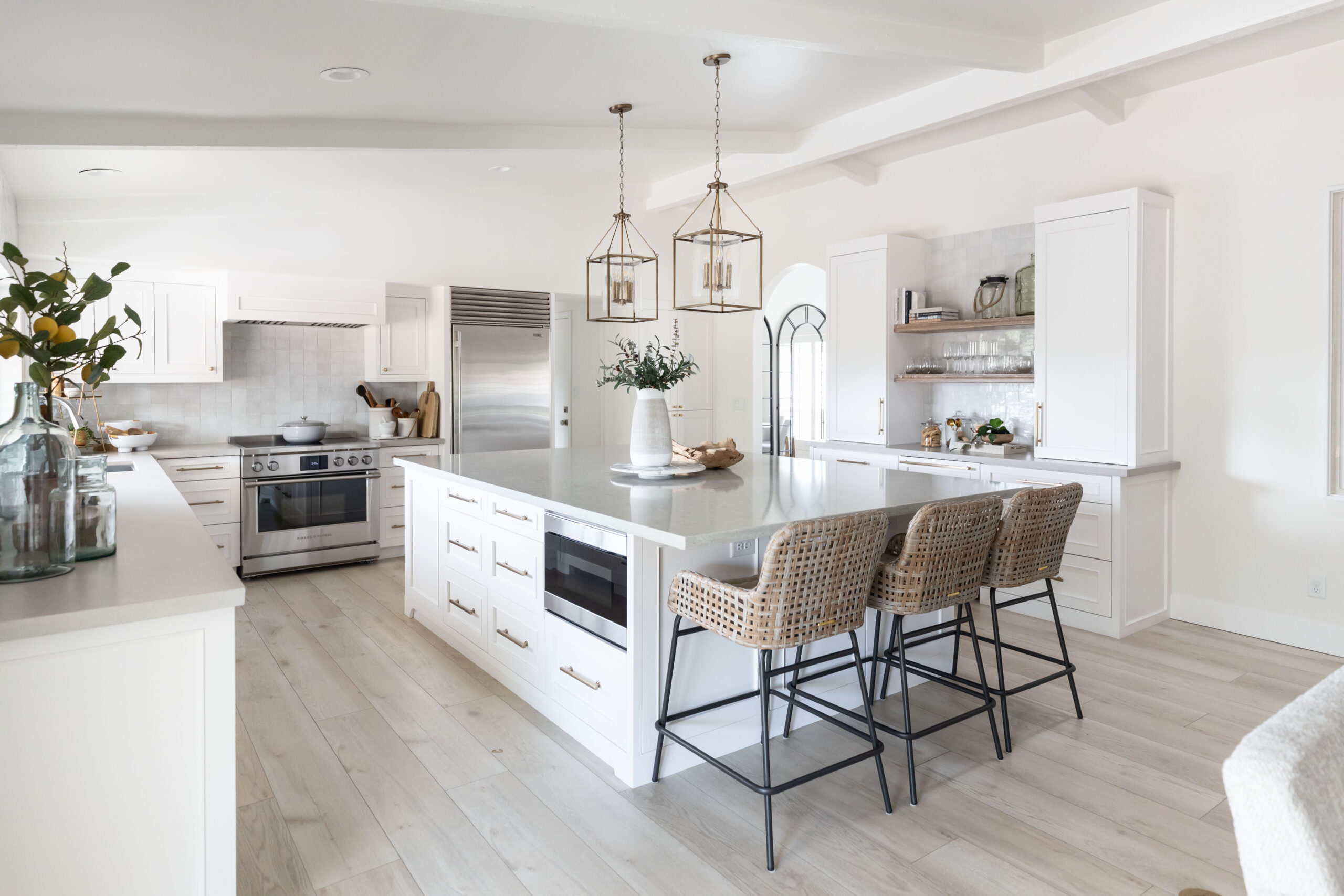 Frances Designs Kitchen Portfolio image. Contemporary custom white cabinets and extra large kitchen island.